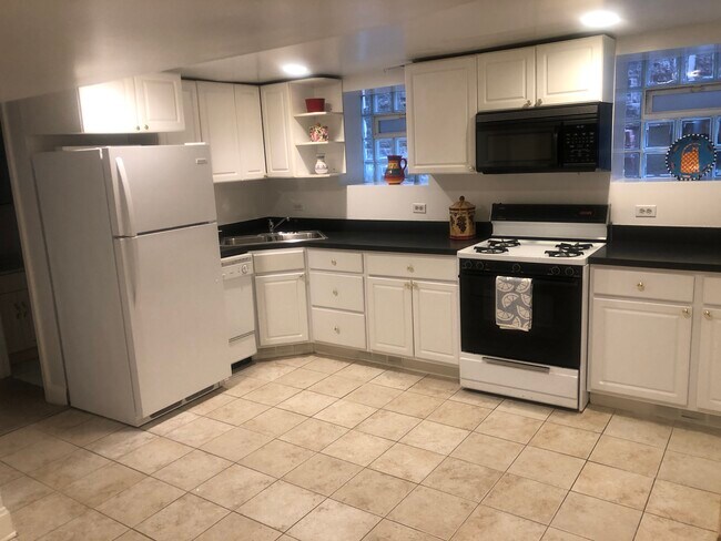Kitchen - 1964 N Orchard St Apartments