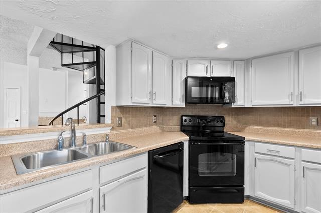 Foto del edificio - 5590 Spring Valley Rd