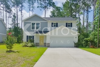 Building Photo - 718 Kalmia Pl SE
