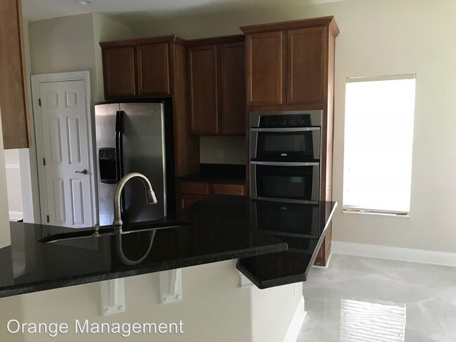 Building Photo - 4 br, 2.5 bath House - 6899 Lucca St.