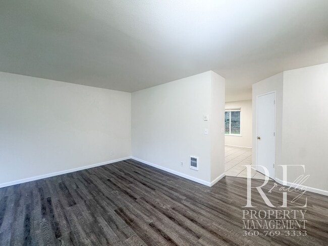 Building Photo - Duplex Living with Expansive Yard, LVP Flooring & Spacious Layout