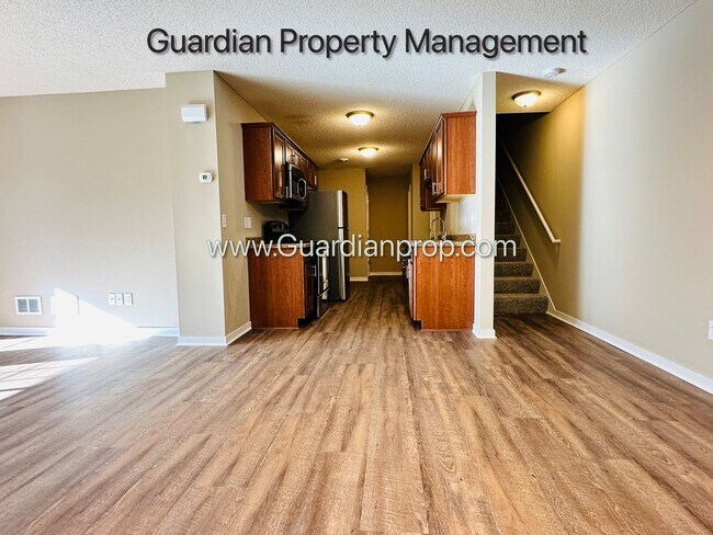 Building Photo - North Brooklyn Park Town Home, Dedicated Office, 2 Car Garage, Washer/Dryer, Front Patio