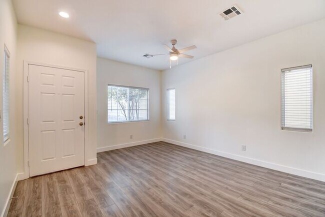 Building Photo - Great home with 4 bedrooms, 2.5 baths. New Floors Paint and Countertops.