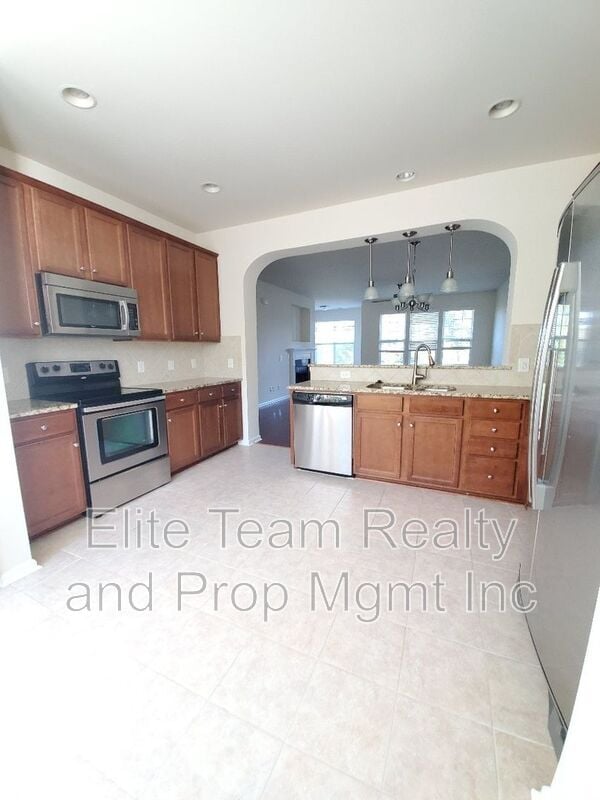 Photo - 11190 Bridgewater Dr Townhome