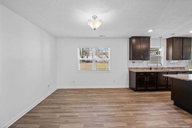 Building Photo - 6915 Wickersham Rd