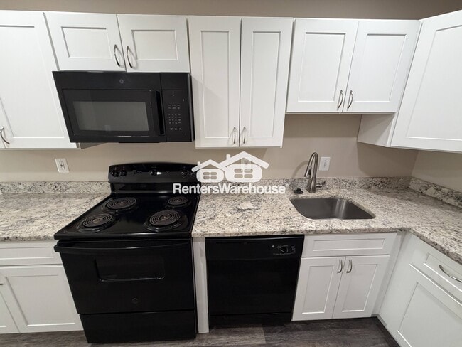 Building Photo - 7538 Woodbine Dr