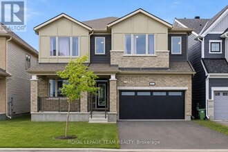 Building Photo - 2413 Watercolours Way
