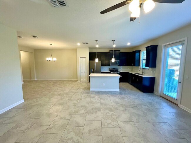 Building Photo - 4 Bedroom, 3.5 Bath Townhome in Lake Nona-...