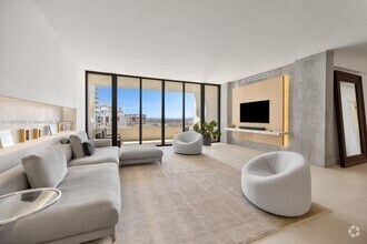 Building Photo - 10205 Collins Ave