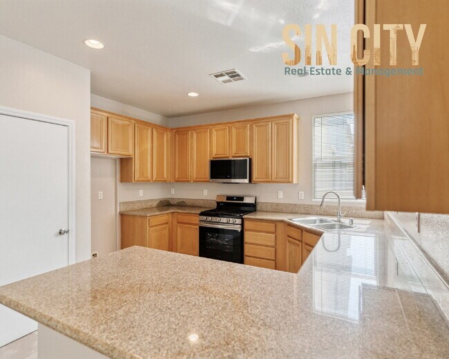 Building Photo - "Spacious 4-Bedroom Retreat on Arrow Stone...