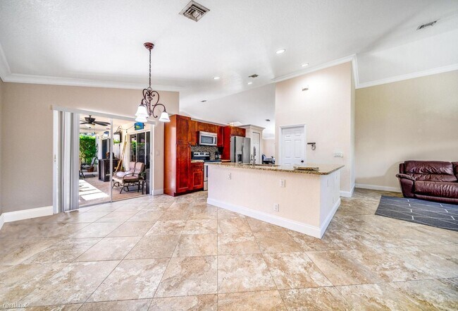 Foto del edificio - 4 br, 2 bath House - 6766 Blue Bay Cir