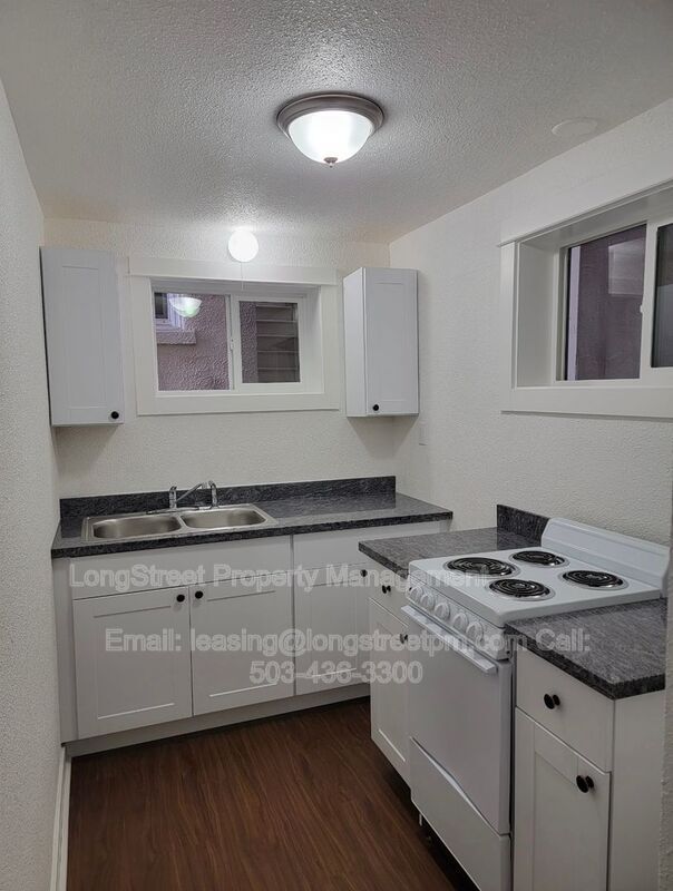 Foto del edificio - 205 NW Kings Blvd
