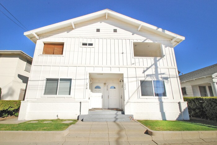 Primary Photo - Updated 2 bedroom with GARAGE + Laundry