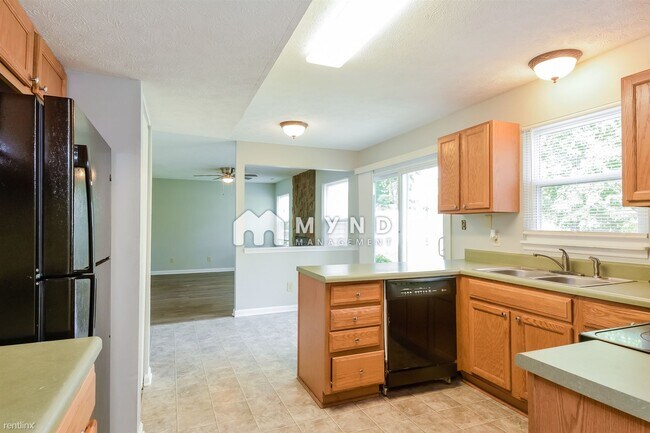 Building Photo - 4 br, 2.5 bath House - 7925 Mcguire Dr
