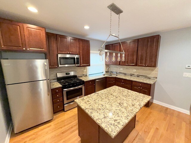 Building Photo - 4204 N Melvina Ave