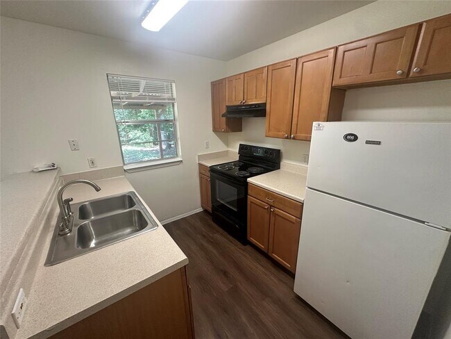 Foto del edificio - 8510 Woodstone Dr