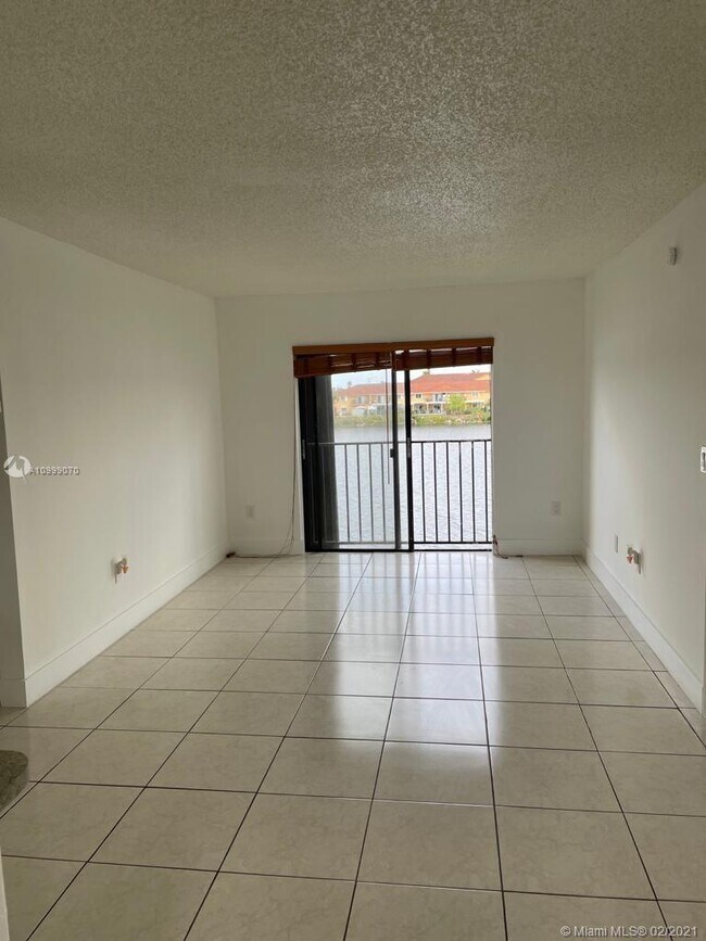 Building Photo - 9917 W Okeechobee Rd