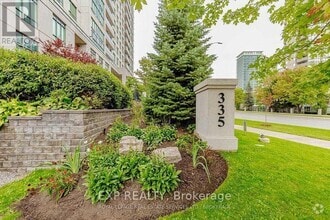 Building Photo - 335-335 Rathburn Rd W