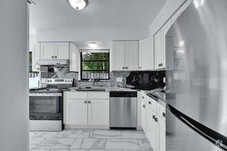 Building Photo - 498 NE 42nd St