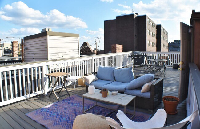 Building Photo - $4650 South End Penthouse Unit with Roof Deck and In-Unit laundry for rent.