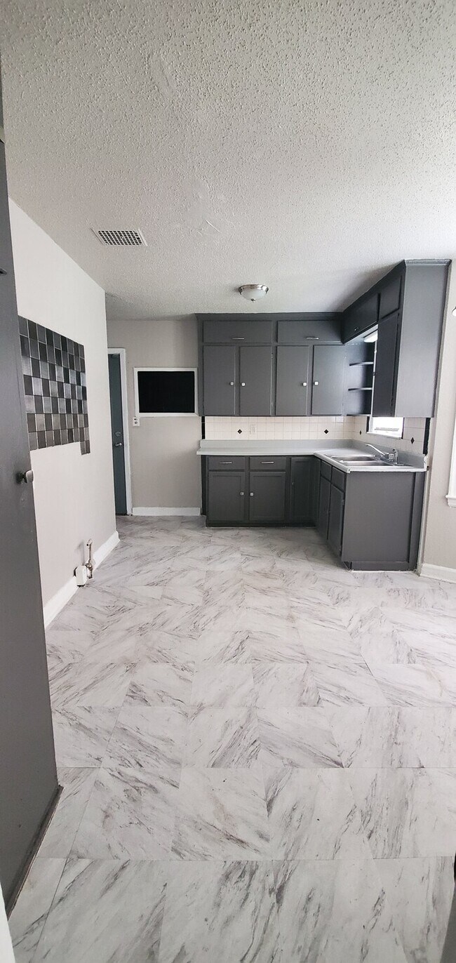 Building Photo - Renovated Bungalow w/ Semi Finished Basement