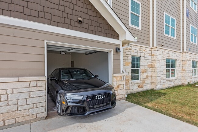 Attached Garages Available - Village at Pepper Creek Apartments
