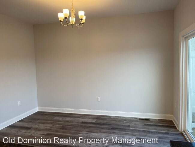 Building Photo - 3 br, 2.5 bath House - 1115 Bluemoon Drive
