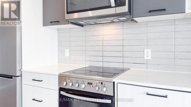 Building Photo - 2300-2300 St Clair Ave W