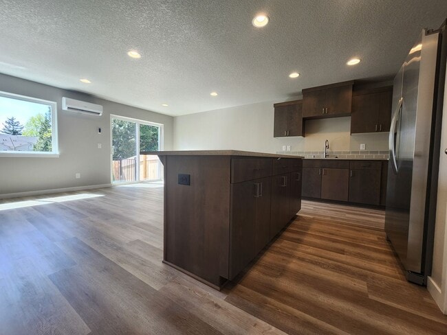 Building Photo - MOVE IN SPECIAL! Brand New Townhome in Cen...