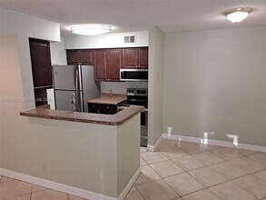 Building Photo - 3200 N Palm Aire Dr