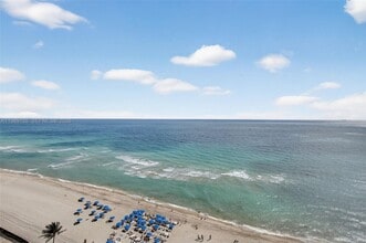 Building Photo - 18671 Collins Ave