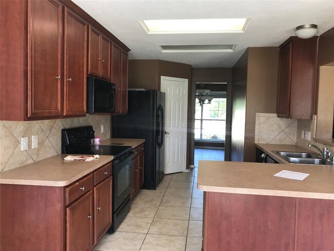 Foto del edificio - 6510 Canyon Mist Ln