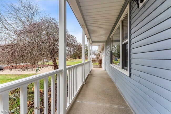 Building Photo - 5879 S Arlington Rd