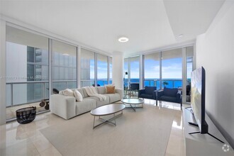 Building Photo - 17121 Collins Ave