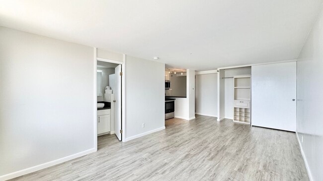 Building Photo - RENOVATED, PENTHOUSE VIEWS - Studio Unit i...