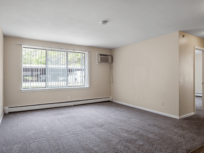 Living Room with Large Window - Shores of Roosevelt Park