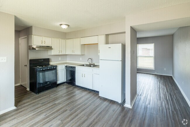 3 habitaciones, 1 baño - 1035 pies cuadrados - Cocina - River Pointe Townhomes