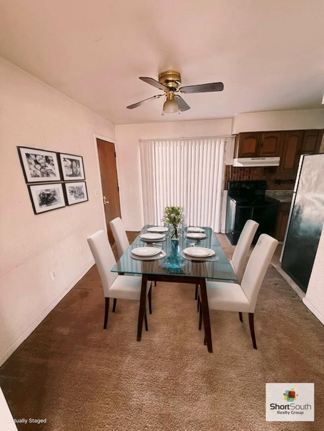 Building Photo - Updated - 2 bed 1.5 bath, Duplex with attached garage and fenced in backyard