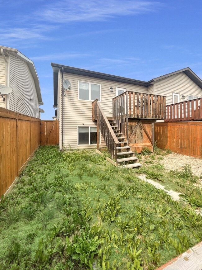 Building Photo - 9061-9131 131 Ave