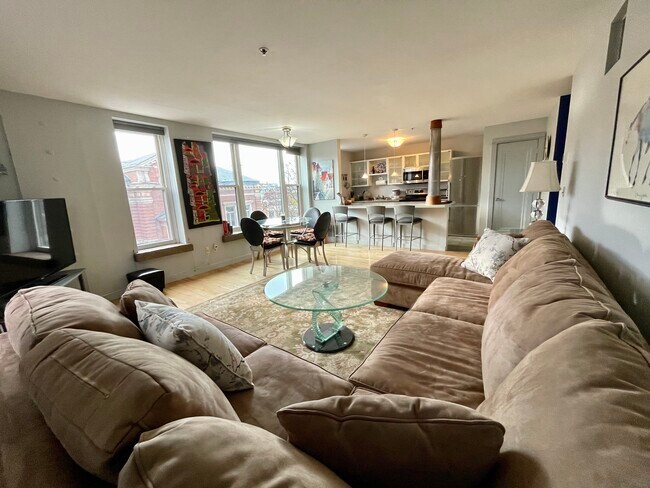 Living room overlooks College St & Downtown with lots of natural light! - 230 College St