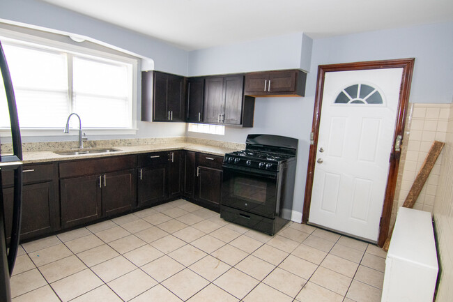 Building Photo - 9150 S Colfax Ave