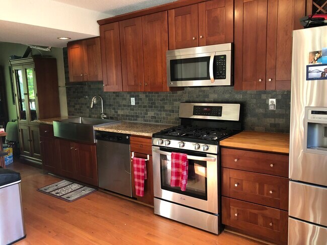 Granite and butcher block countertops. 5 burner gas stove - 56 Uplands Way