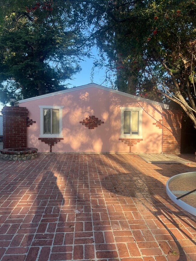 Western side of Guesthouse looking onto Brick patio - 15138 Encanto Dr