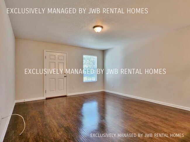 Building Photo - 8409 McGirts Village Ln