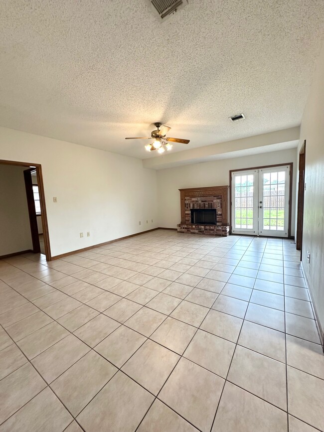 Living room with Fireplace - 6853 Willie Lou Ave