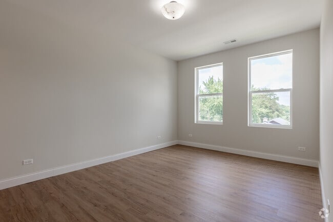 3BR, 2BA - 1,300SF - Primary Bedroom - The Schoolhouse Apartments