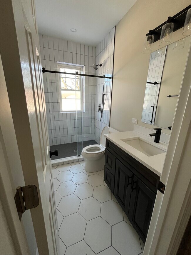 Photo - 5857 W Byron St Apartments