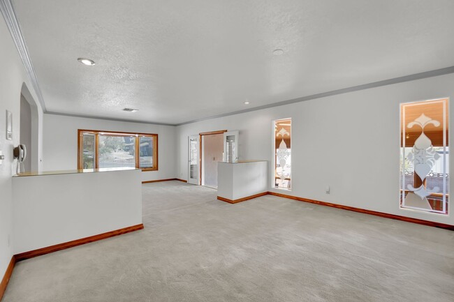 Building Photo - Stunning Tri-Level Custom Home!