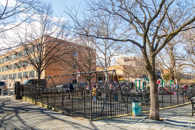 The Carroll Park playground has plenty of space for children to run and play.