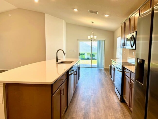 Building Photo - Brand New Single Family 4/2 in Astonia, Da...